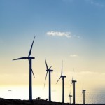 Photo of Wind Turbines against blue sky
